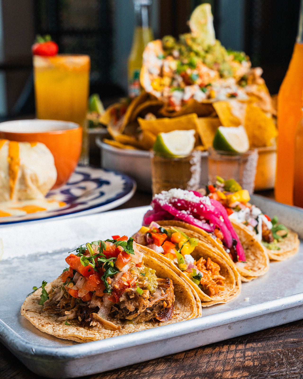 A metal tray of assorted street tacos at Social Cantina in Germantown, Nashville