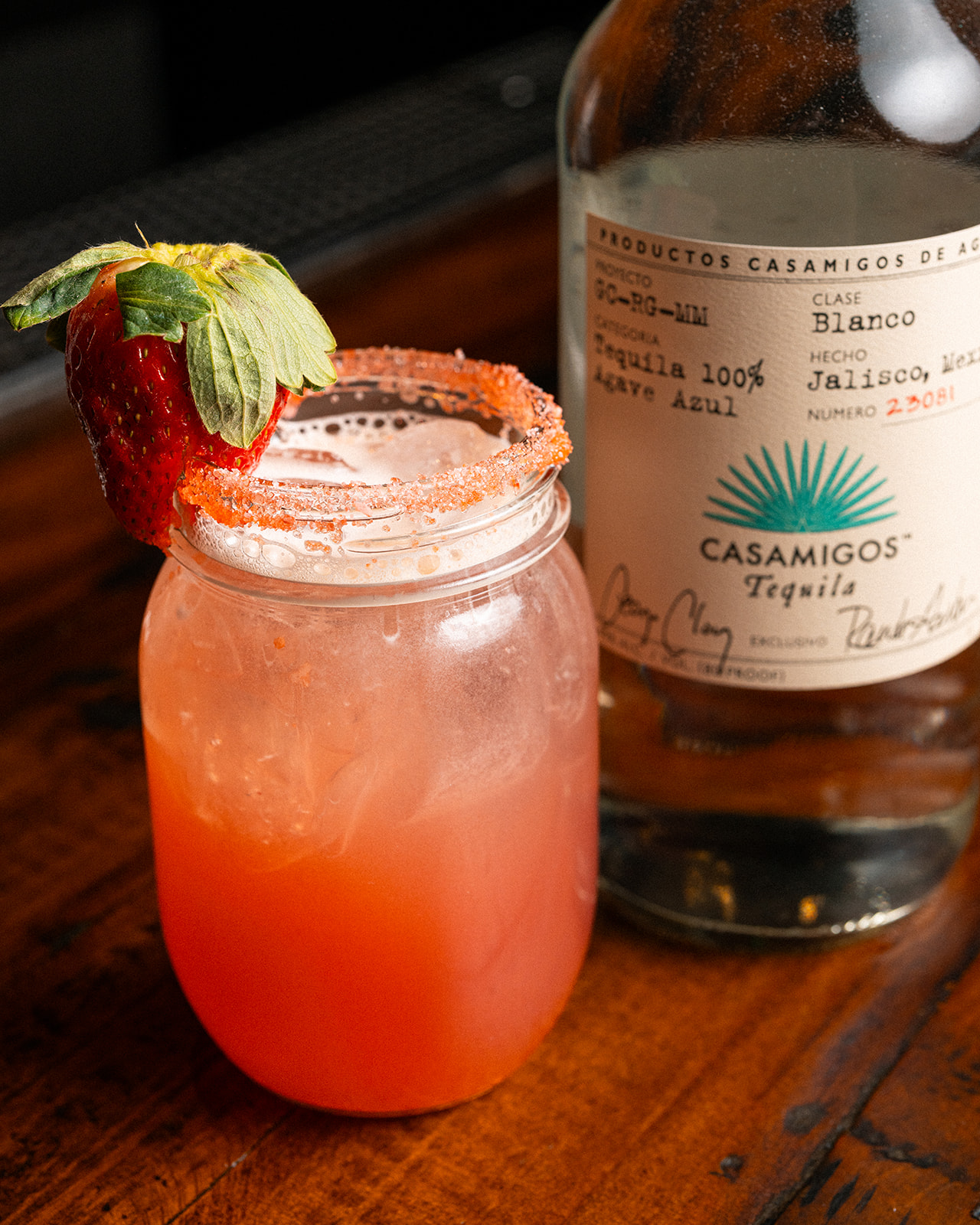 Strawberry margarita with a sugared rim in a mason jar at Social Cantina Nashville